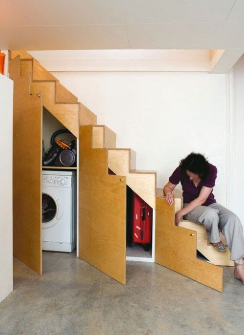 Under the stairs is another place where you can hide a washing machine and laundry bins.