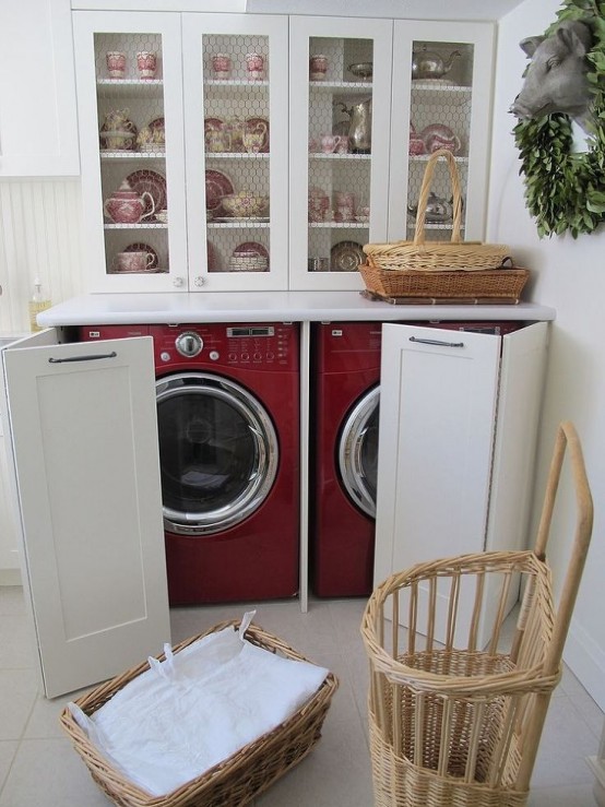 Hide your appliances in a bottom part of a display cabinet for plates.
