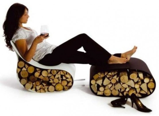 a unique furniture piece - a white chair and a brown ottoman that both hold some firewood, it's a cool and fresh idea to store it