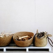 a number of baskets for storing wood and branches will add a relaxed and natural feel to the space