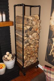 an industrial wood and metal firewood stand is a great idea for a rustic or farmhouse room and can be used outdoors, too