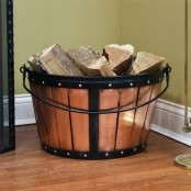 a faux wooden basket with firewood will add a cozy farmhouse feel to the space