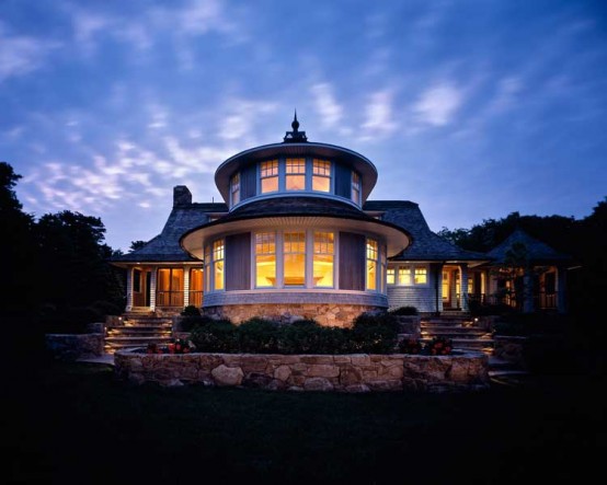 Curved House Design With Extensive Interior Woodwork