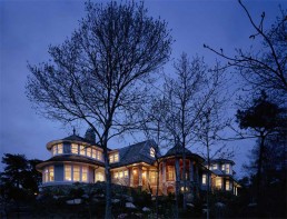 Curved House Design With Extensive Interior Woodwork