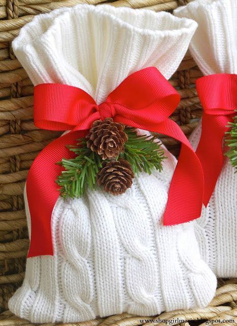 white patterned sacks with red bows, pinecones and evergreens to pack Christmas gifts will make them much more personalized and will show your attitude