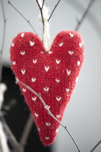 a red knit heart with tiny white hearts as a print is a very cute and really heart-warming Christmas ornament