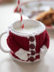 a mug in a Santa Claus inspired cozy is a very cool idea, knit such cozies to give to your friends and family