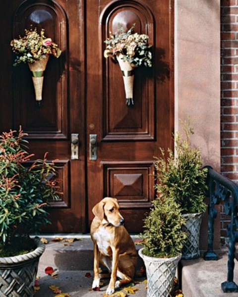 Two wreathes or hanging bouquets are necessary for double doors.