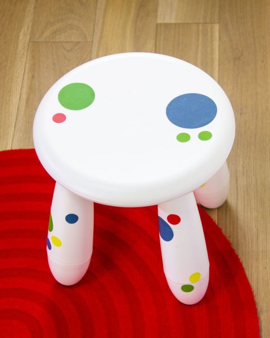 a white IKEA Mammut stool with colorful polka dots is a bold and cool idea - add removable stickers to make it bolder