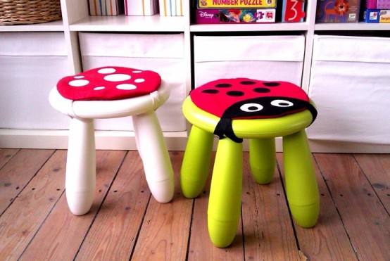 green and white IKEA Mammut stools with lady bug pillows on top for sitting comfortably on them