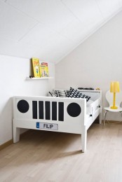 a neutral kid’s room with a white Sundvik bed turned into a little car and yellow touches for a bold look