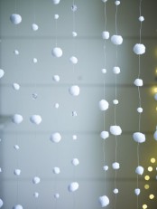 hanging mini snowballs and crystals as a simple and cute winter decoration or space divider, looks very snowy and chic