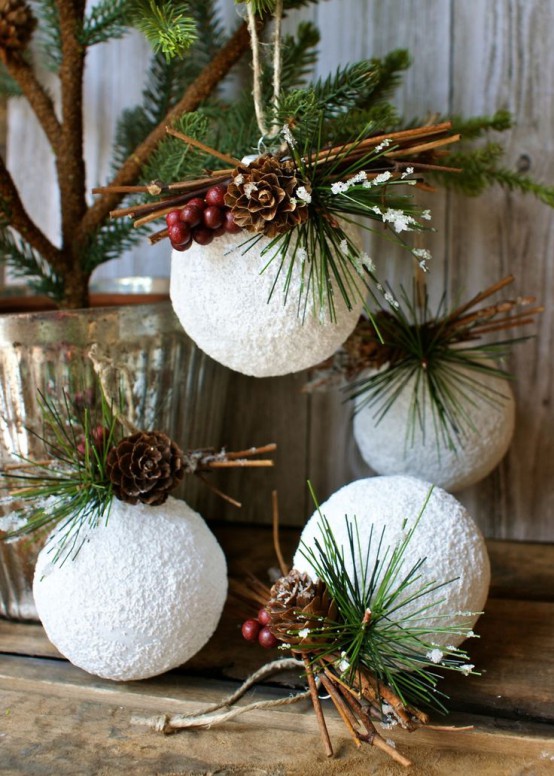 snowballs with fir twigs, pinecones, berries and twigs are great Christmas ornaments or just decorations