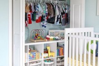 a closet organized with lots of boxes, baskets, clothes hangers s a comfy idea