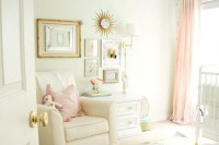 a peaceful and lovely girl’s nursery done in neutrals, with touches of pink and gold, with a refined gallery wall and a vintage chandelier