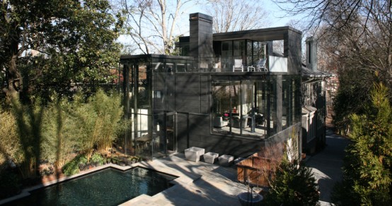 Dark Glass House With City Skyline Views