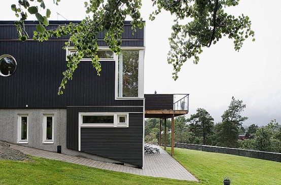 Dark Swedish House Deisgn With Dettached Garage