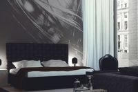 dark tufted masculine headboard