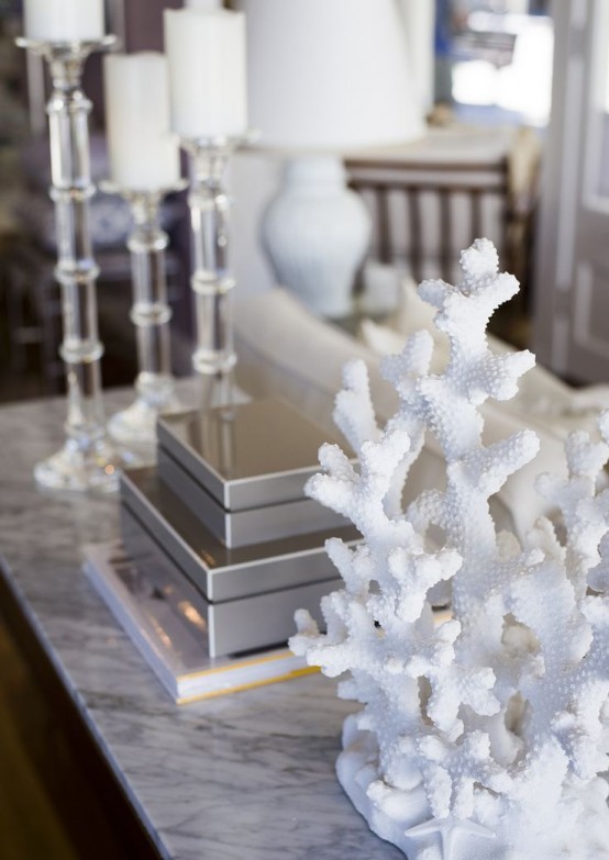 display corals on your console table to give a seaside feel to your living room or entryway and enjoy the look