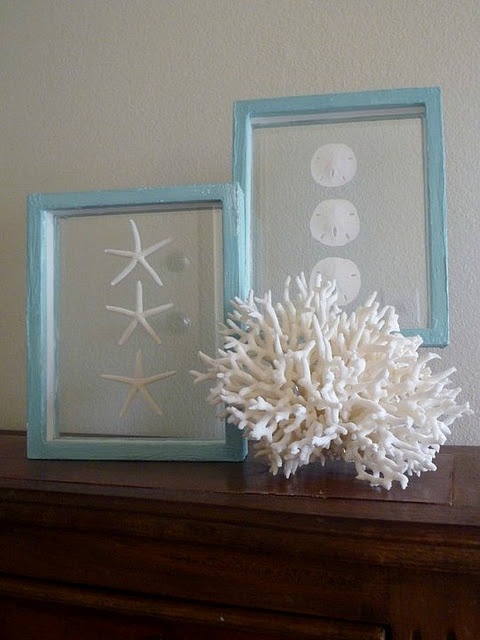 corals and seashells and starfish artworks on the mantel make it feel beach-like and cool