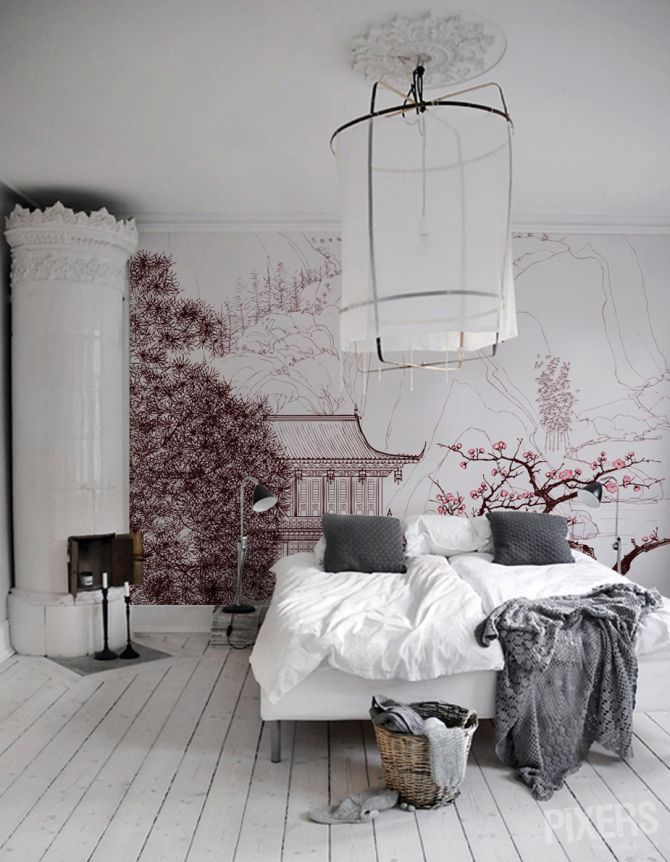 delicate cherry blossom on the wall makes the room look chic, romantic and spring like