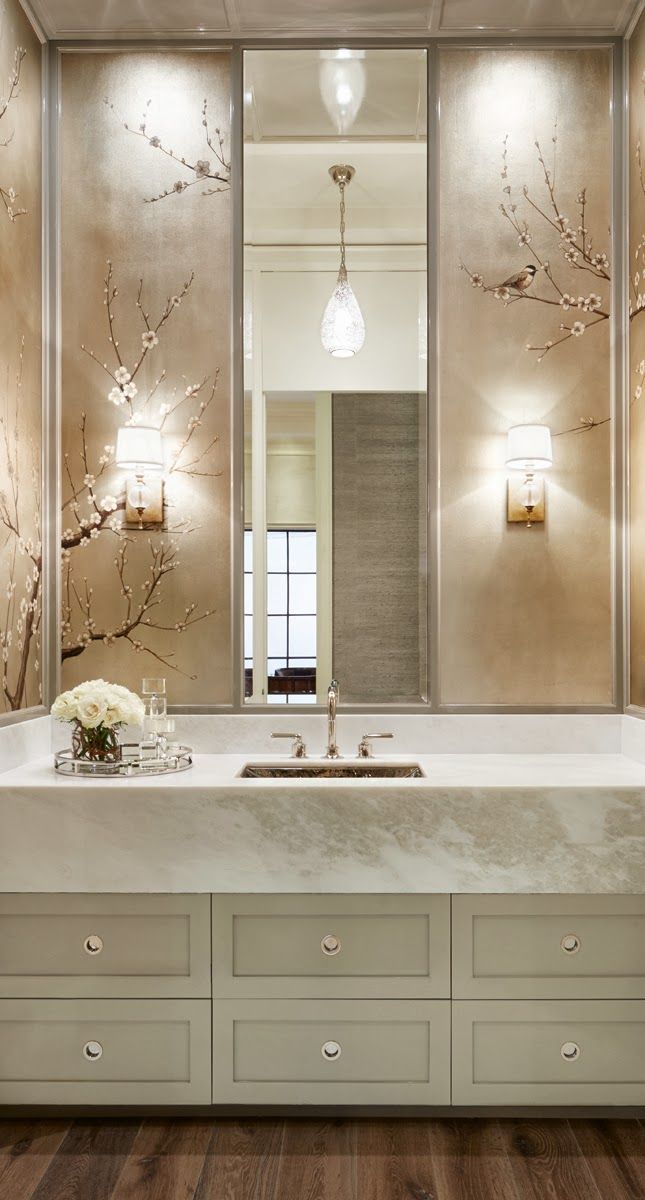 cherry blossom decor on neutral tiles is a chic idea for a modern bathroom