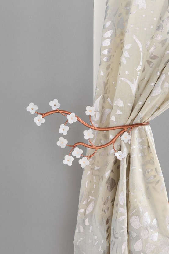 stylized cherry blossom branches as curtain holders - a little and cute accessory to spruce your home for spring