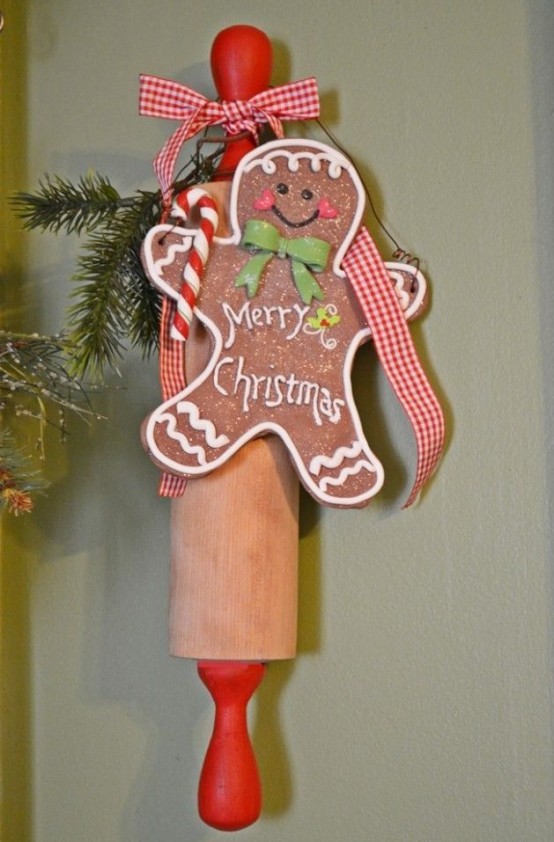 a rolling pin and a large faux gingerbread man compose lovely kitchen decor for Christmas