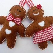 pretty felt gingerbread cookie decorations – a boy with a plaid bow and a girl in a plaid skirt for rustic holiday decor