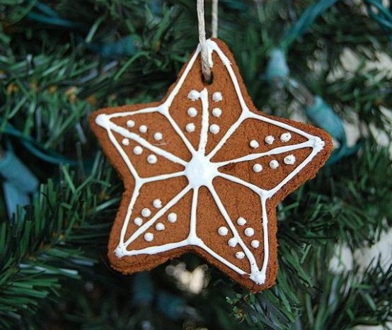 a glazed gingerbread Christmas star cookie is a pretty decoration or an ornament for the holidays