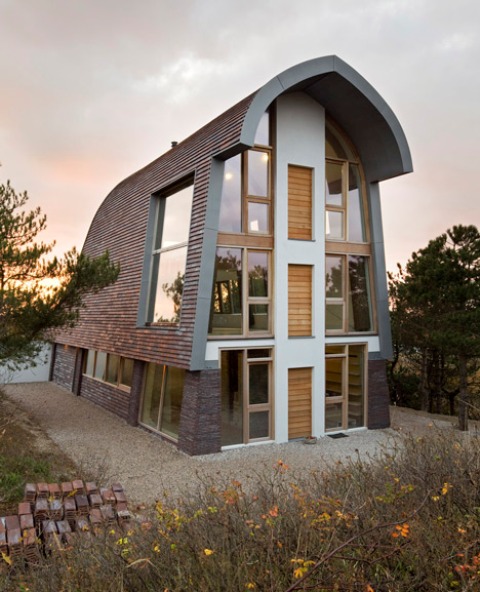 Dune House  With Unique Architecture And Lots of White Inside