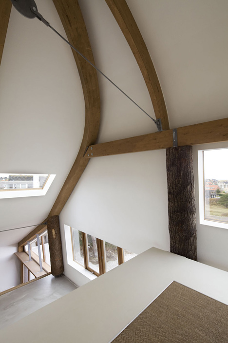 Dune House With Unqiue Architecture And Lots Of White Color