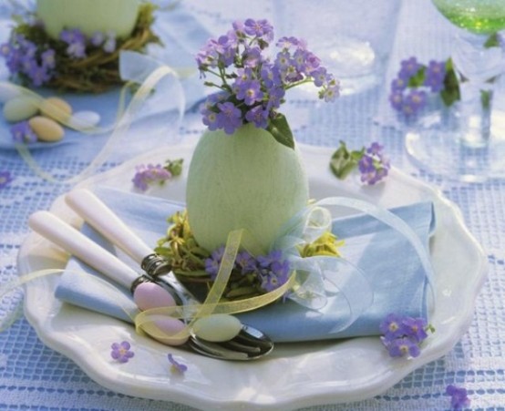 a pastel green egg with purple blooms will mark each place setting in a stylish way
