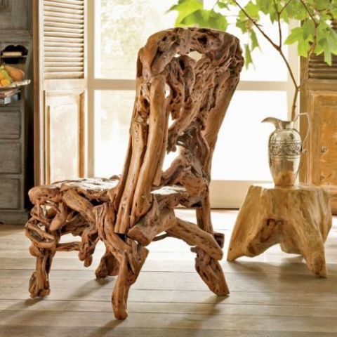 a unique chair made of driftwood is a lovely idea for a coastal, beach or just rustic space