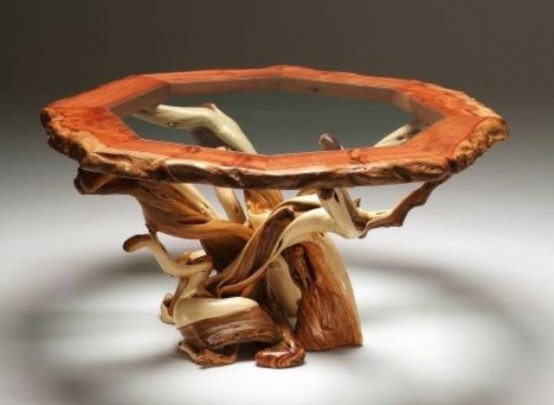 a driftwood table with a living edge glass tabletop is a lovely idea for a rustic space or for a boho one
