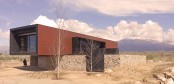 edgy-modern-andes-house-wrapped-in-a-rusty-metal-shell-3