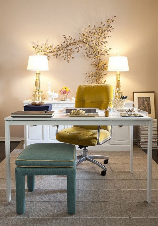 a refined feminine home office with a mustard velvet chair, a blue stool and a gorgeous botanical artwork on the wall