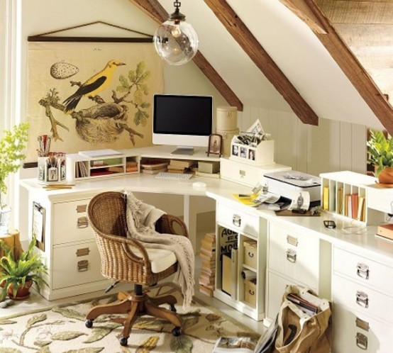 a neutral feminine home office with wooden beams, a large curved desk, potted greenery and botanical artworks