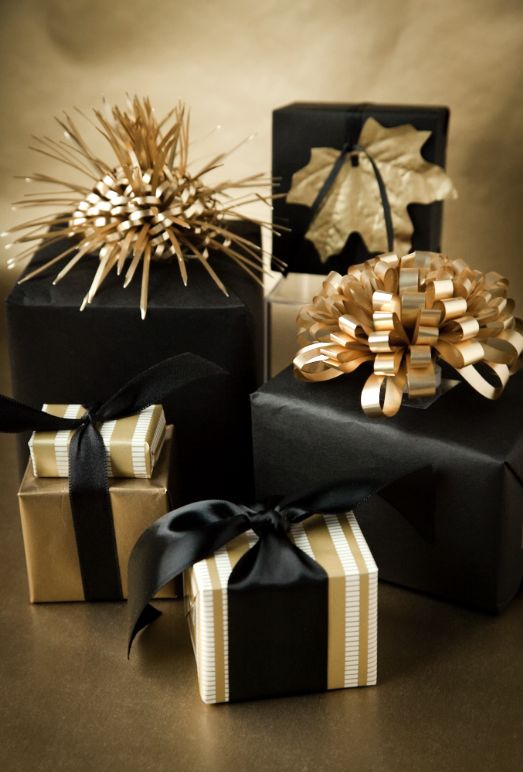 black and gold Christmas gifts with bows on tops are amazing for Christmas and NYE and look very festive and bold