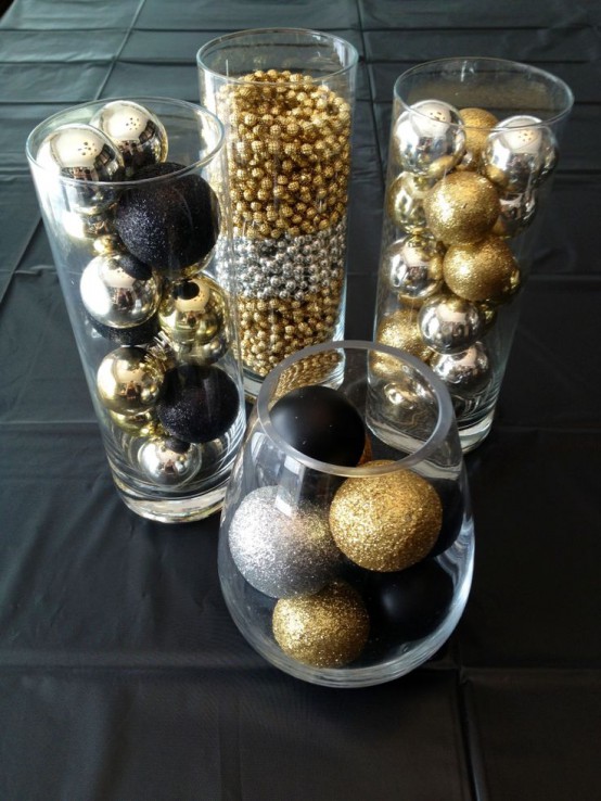 glass vases and bowl with assorted silver, gold and black Christmas ornaments, matte, glitter and glossy ones is a great decoration itself