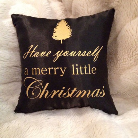 a black and gold pillow decorated for Christmas is a lovely and chic piece for holidays, you can make it yourself