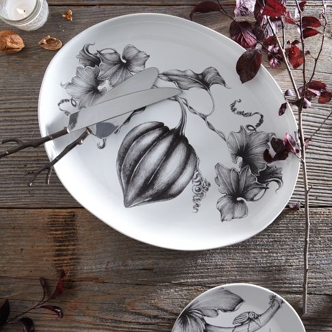 elegant black and white plates with botanical motifs can be used to make your Thanksgiving tablescape cooler and more chic