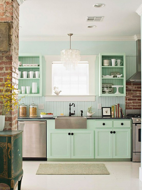 Kitchen with an exposed brick wall would look interesting even if isn't designed in industrial style.