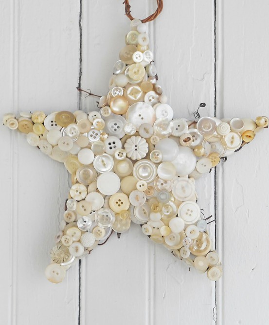 a large white and pearl button star is a beautiful and cool decoration for Christmas