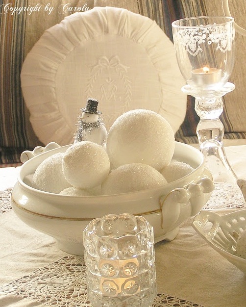 white vintage Christmas decor with a large tray with snowball style ornaments, a snowman and glass candleholders is amazing