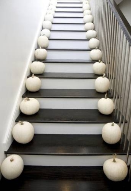 line up the staircase with white pumpkins to make your home feel like fall