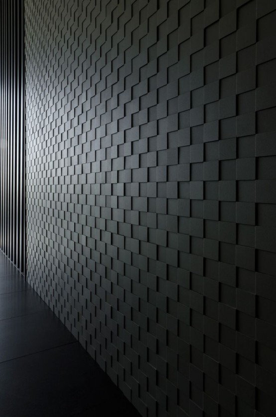 a 3D dark panel is a great option to cover your walls and make them catchy, bold and very modern