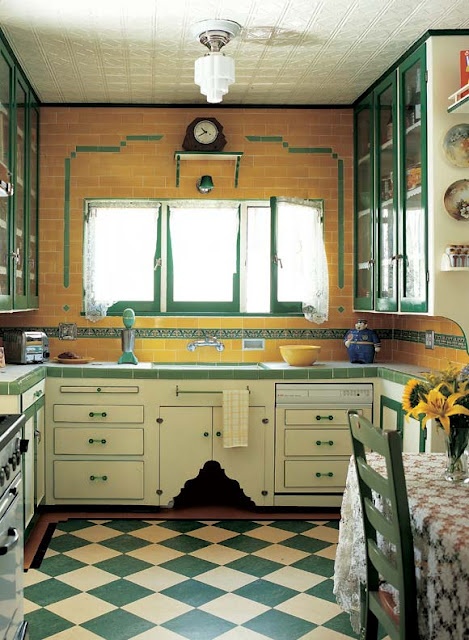 a colorful vintage kitchen with yellow tiles on the walls, green and white cabinets, a green and white checked floor, green countertops and yellow cookware