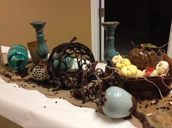 brigth fauux pumpkins and neutral fresh ones, vintage candleholders and vases for fall home decor