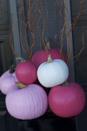 lavender, light pink, fuchsia and white pumpkins stacked will give an unusual bold touch to your space and a fall feel